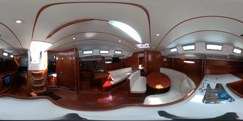 Caravan Yacht Photos Pics Interior of 2002 Beneteau First 47.7 yacht, featuring elegant wood finishes and modern amenities.