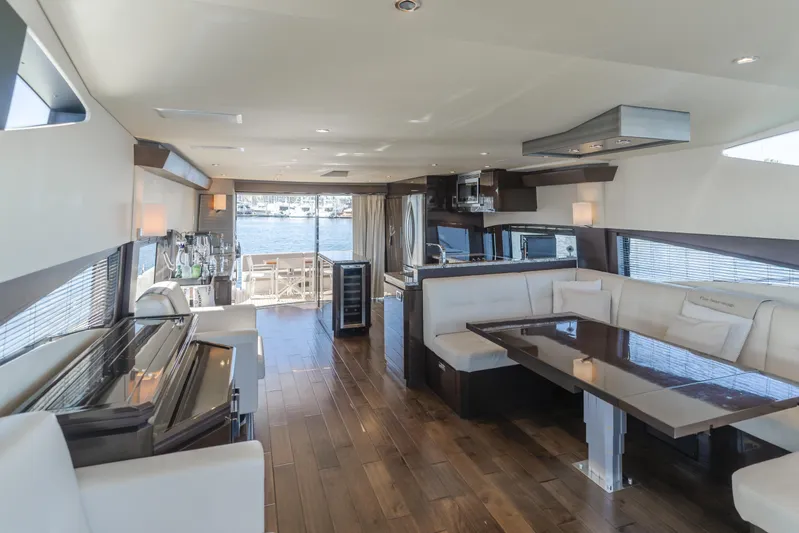 Fine Seas-onings Yacht Photos Pics Luxurious interior of 2018 Marquis 720 Fly yacht with elegant seating and dining area.