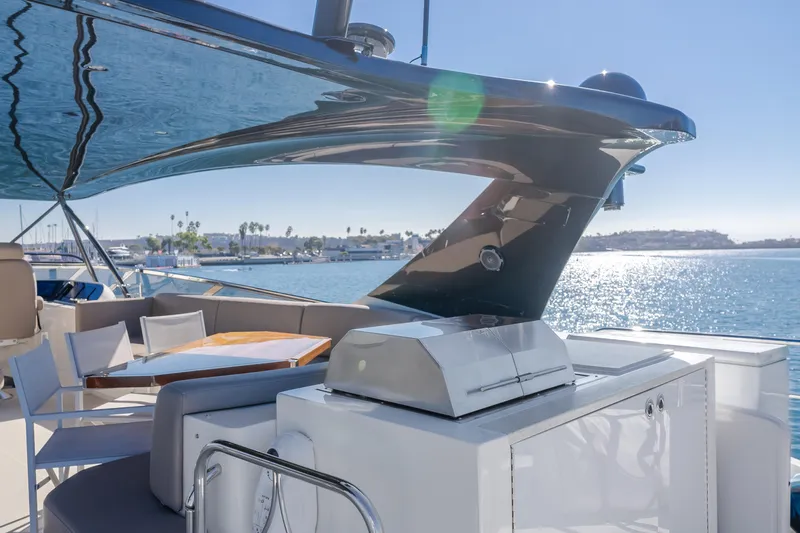 Fine Seas-onings Yacht Photos Pics Luxurious 2018 Marquis 720 Fly yacht deck with seating and ocean view.