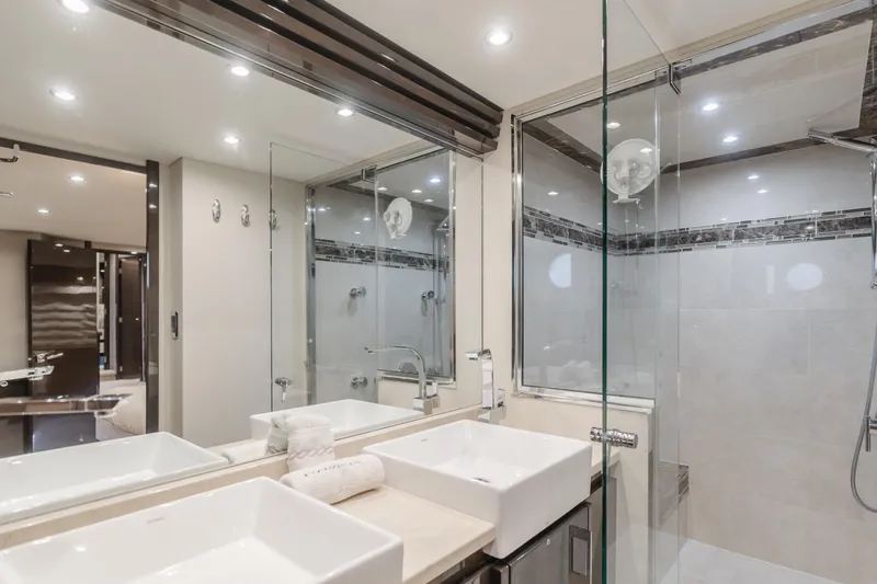 Fine Seas-onings Yacht Photos Pics Luxurious bathroom in 2018 Marquis 720 Fly yacht with modern fixtures and glass shower.