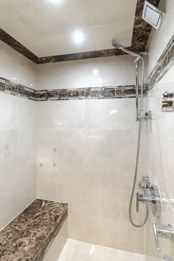 Fine Seas-onings Yacht Photos Pics Luxurious shower in 2018 Marquis 720 Fly yacht with marble accents and modern fixtures.