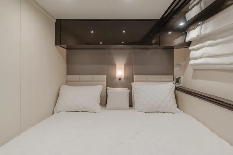 Fine Seas-onings Yacht Photos Pics Luxurious bedroom interior of 2018 Marquis 720 Fly yacht with elegant bedding.