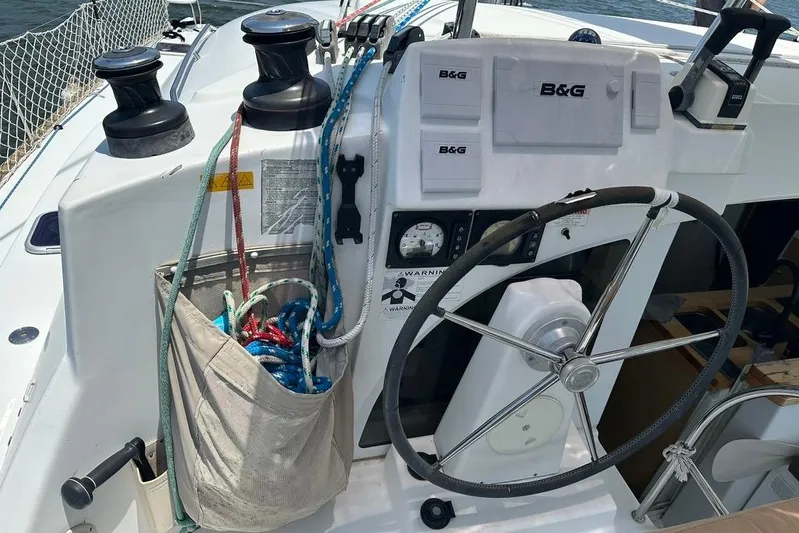 Alice Yacht Photos Pics Steering wheel and controls of a 2015 Lagoon 380 S2 catamaran.