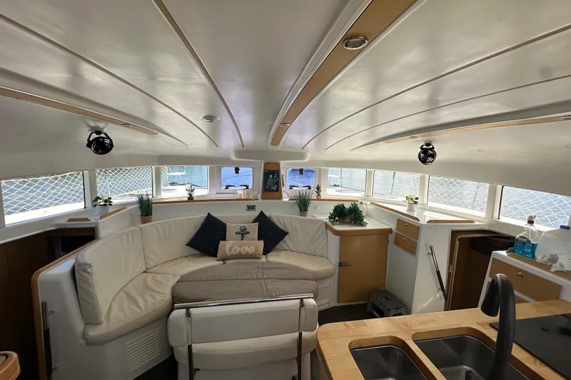 Alice Yacht Photos Pics Interior of 2015 Lagoon 380 S2 catamaran with modern seating and decor.