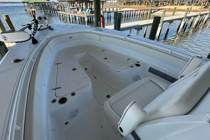  Yacht Photos Pics 2024 Sea Hunt Gamefish 30 Forward Seating boat interior with white cushioned seats.