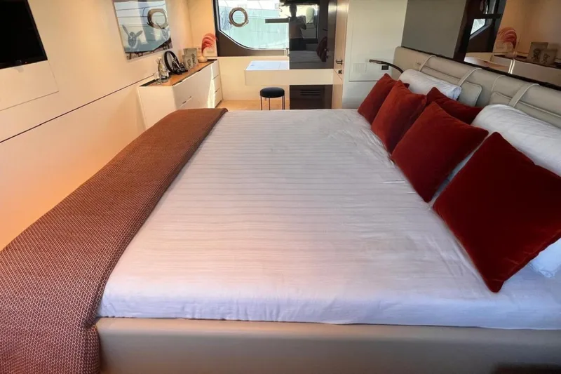  Yacht Photos Pics Luxurious bedroom interior on 2020 Bluegame BGX 70 yacht with elegant decor and plush bedding.