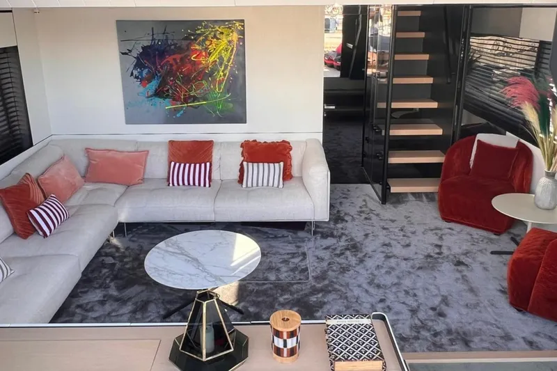  Yacht Photos Pics Luxurious interior of 2020 Bluegame BGX 70 yacht with modern decor and abstract art.