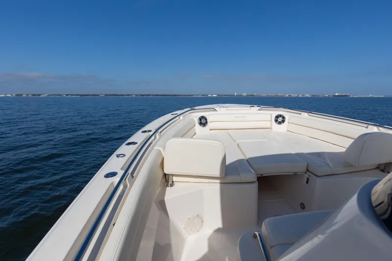 No Name Yacht Photos Pics 2022 Grady-White 326 CANYON boat on open water, clear blue sky.