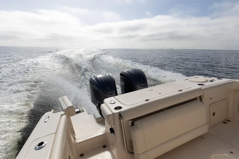 No Name Yacht Photos Pics Grady-White 326 CANYON 2022 boat cruising on open water, twin engines visible.