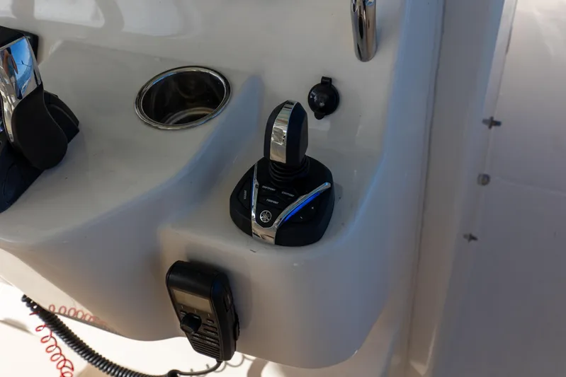No Name Yacht Photos Pics Control panel of 2022 Grady-White 326 CANYON boat with joystick and cup holder.