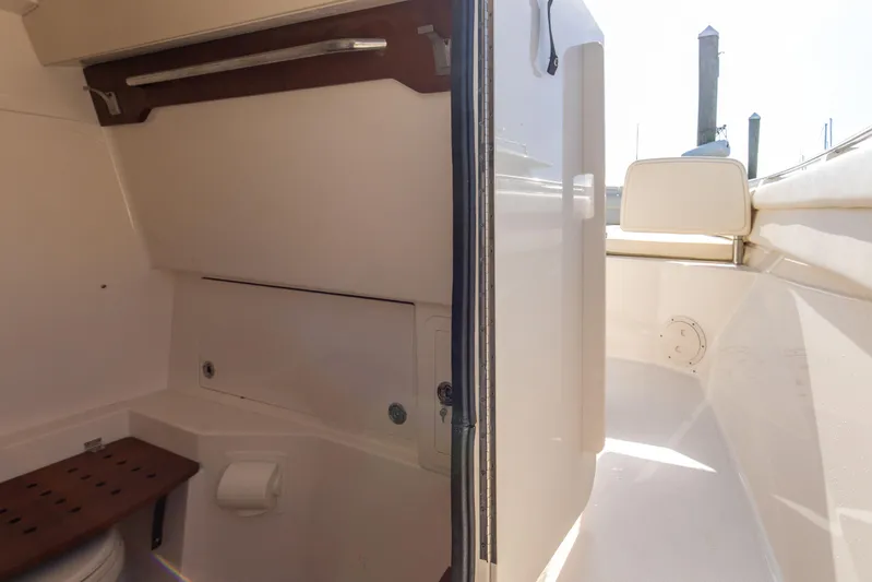 No Name Yacht Photos Pics 2022 Grady-White 326 CANYON boat interior with seating and storage.