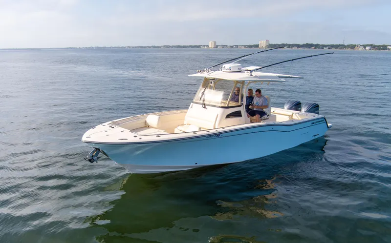 No Name Yacht Photos Pics 2022 Grady-White 326 CANYON boat cruising on calm waters.