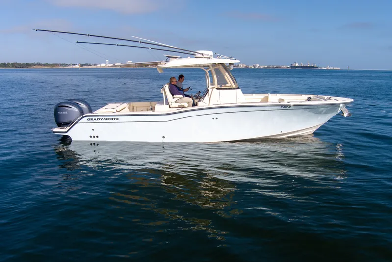 No Name Yacht Photos Pics 2022 Grady-White 326 CANYON boat cruising on calm ocean waters.