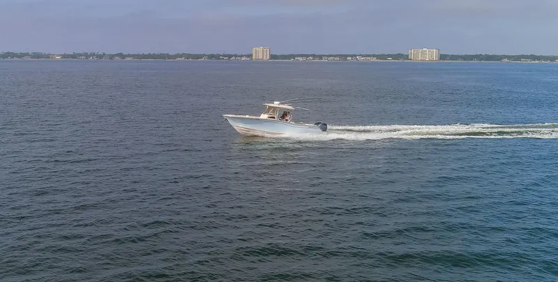 No Name Yacht Photos Pics 2022 Grady-White 326 CANYON boat cruising on open water.