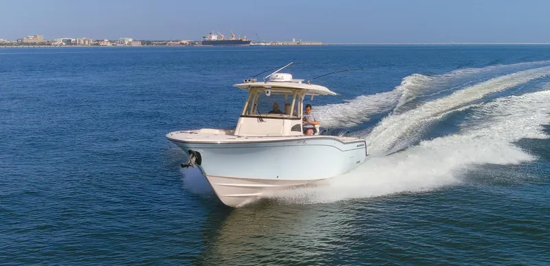 No Name Yacht Photos Pics 2022 Grady-White 326 CANYON boat cruising on open water.