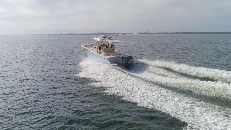 No Name Yacht Photos Pics 2022 Grady-White 326 CANYON boat cruising on open water.