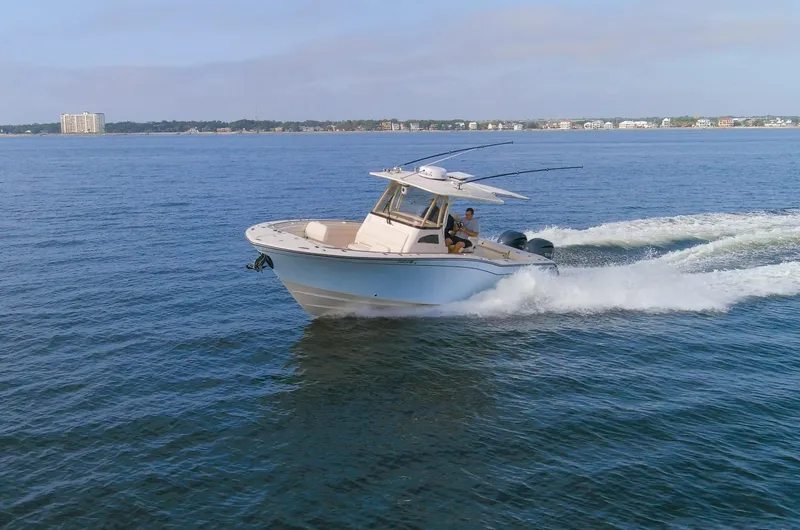 No Name Yacht Photos Pics 2022 Grady-White 326 CANYON boat cruising on open water.