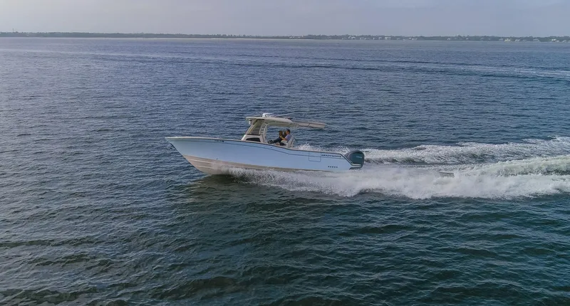 No Name Yacht Photos Pics 2022 Grady-White 326 CANYON boat cruising on open water.