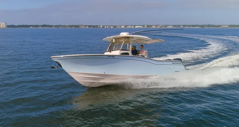 No Name Yacht Photos Pics 2022 Grady-White 326 CANYON boat cruising on open water.