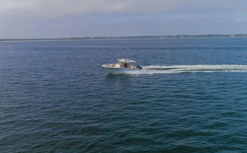 No Name Yacht Photos Pics 2022 Grady-White 326 CANYON boat cruising on open water.