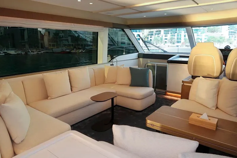 Azimut Magellano 60 Model 2025 Yacht Photos Pics Luxurious interior of 2025 Azimut Magellano 60 yacht with plush seating and modern design.