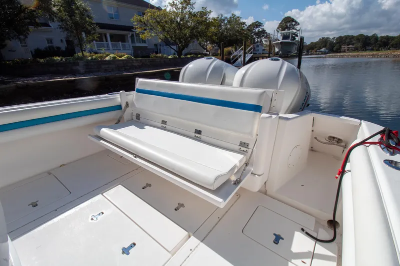 Ami Kids Donation Yacht Photos Pics 2015 Intrepid 327 Center Console boat with foldable seating and twin engines.