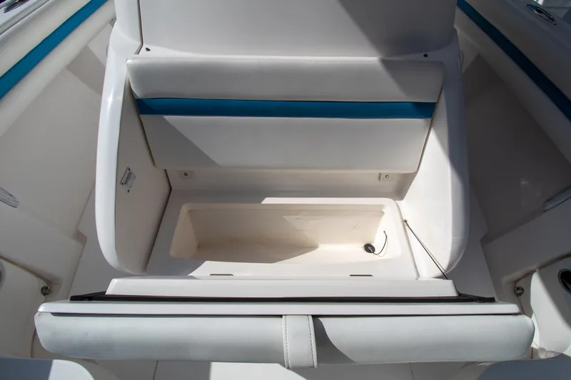 Ami Kids Donation Yacht Photos Pics 2015 Intrepid 327 Center Console boat seat storage compartment.