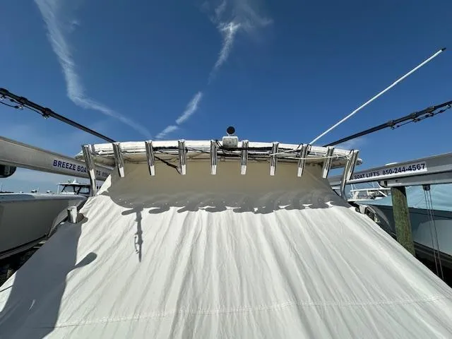  Yacht Photos Pics 2021 AmeraCat 27 Gen II DC boat with covered deck under clear blue sky.