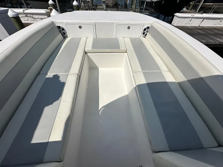  Yacht Photos Pics 2021 AmeraCat 27 Gen II DC boat interior with cushioned seating and storage compartments.