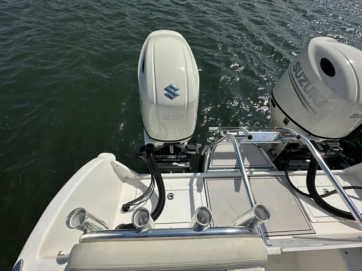  Yacht Photos Pics 2021 AmeraCat 27 Gen II DC boat with dual Suzuki outboard motors on water.