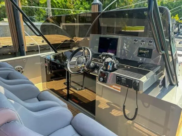  Yacht Photos Pics Cockpit of 2022 De Antonio Yachts D42, featuring modern controls and luxurious seating.