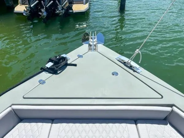  Yacht Photos Pics Bow of 2022 De Antonio Yachts D42, anchored in clear water.