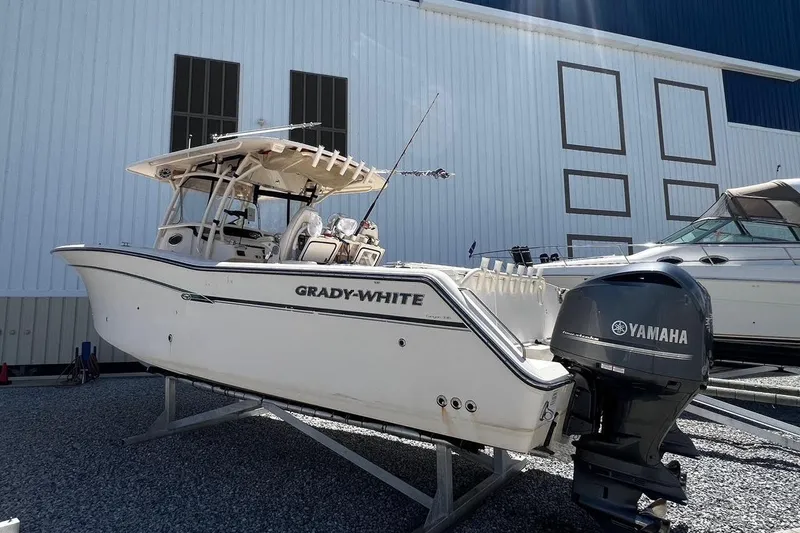  Yacht Photos Pics 2015 Grady-White Canyon 336 boat with Yamaha engine, displayed outdoors.