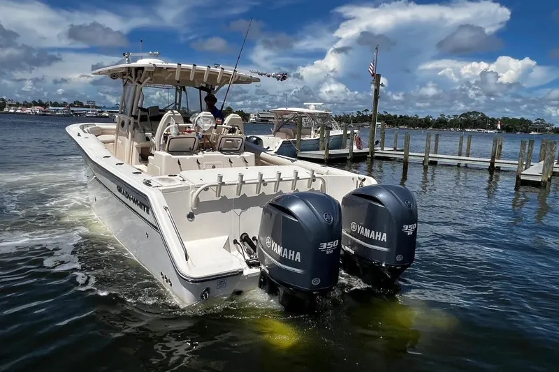  Yacht Photos Pics 2015 Grady-White Canyon 336 boat with Yamaha engines on a sunny day.