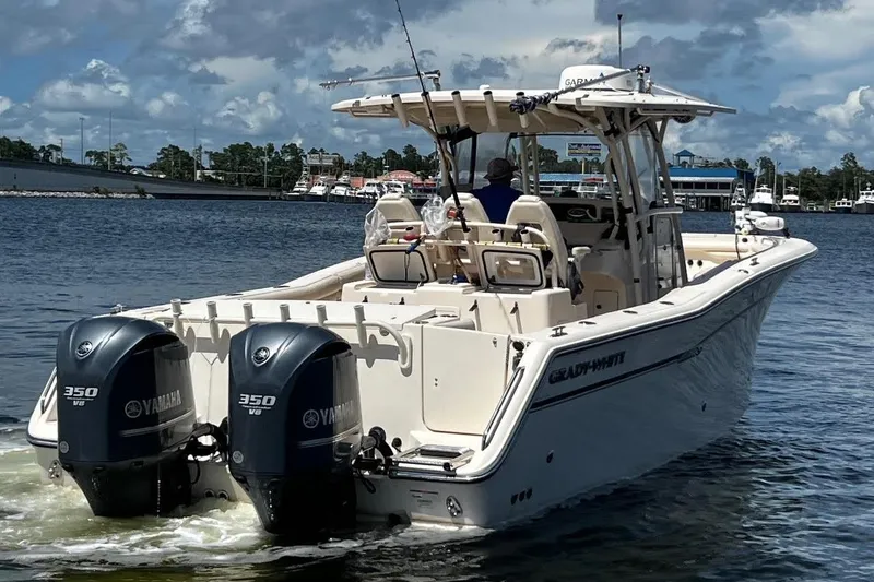  Yacht Photos Pics 2015 Grady-White Canyon 336 boat with dual Yamaha 350 engines on water.