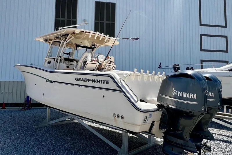  Yacht Photos Pics 2015 Grady-White Canyon 336 boat with Yamaha engines, displayed outdoors.