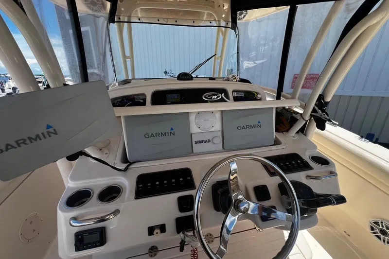  Yacht Photos Pics 2015 Grady-White Canyon 336 boat dashboard with Garmin navigation displays.