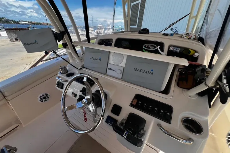 Yacht Photos Pics 2015 Grady-White Canyon 336 boat dashboard with Garmin navigation systems.