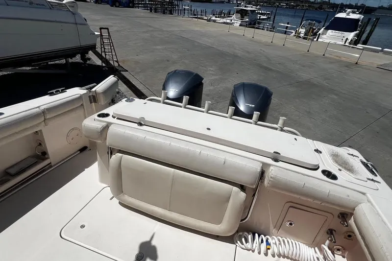  Yacht Photos Pics 2015 Grady-White Canyon 336 boat with dual engines at a marina dock.
