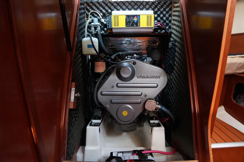 Andiamo! Yacht Photos Pics Engine compartment of a 2007 Beneteau 373 sailboat, featuring a Yanmar engine.
