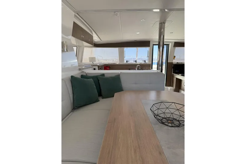 High School Yacht Photos Pics Modern interior of 2023 Bali 4.2 yacht with cozy seating and stylish decor.