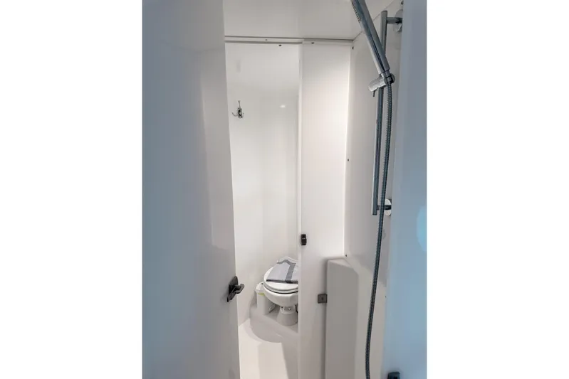 High School Yacht Photos Pics Modern bathroom interior in 2023 Bali 4.2 yacht, featuring shower and toilet.