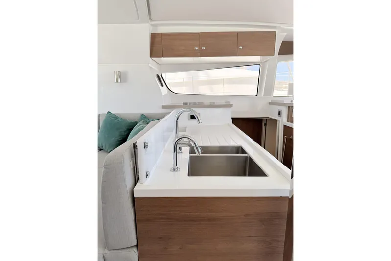 High School Yacht Photos Pics Modern kitchen interior of 2023 Bali 4.2 yacht with sleek design and dual sinks.