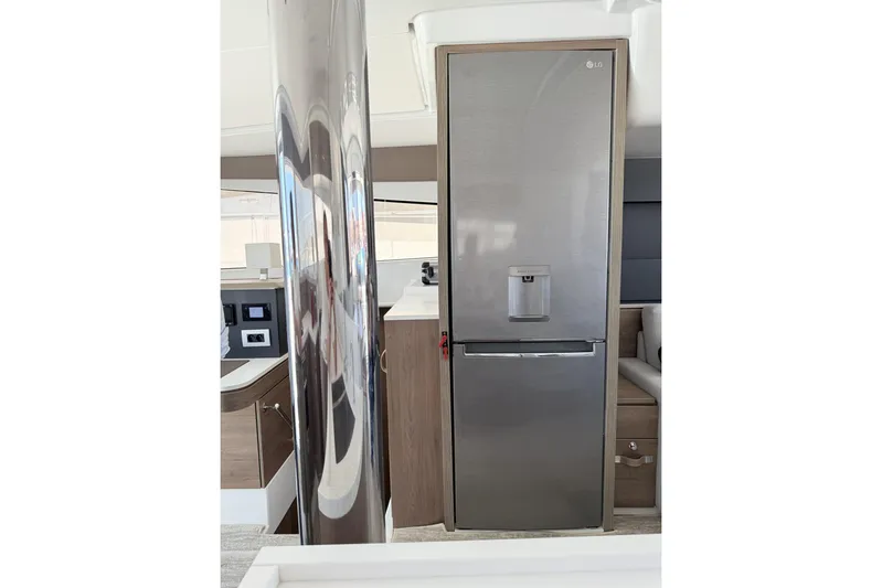 High School Yacht Photos Pics Modern kitchen interior on a 2023 Bali 4.2 yacht with stainless steel refrigerator.