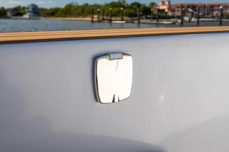  Yacht Photos Pics 2023 Pardo Yachts 43, chrome detail on white exterior, docked by waterfront.