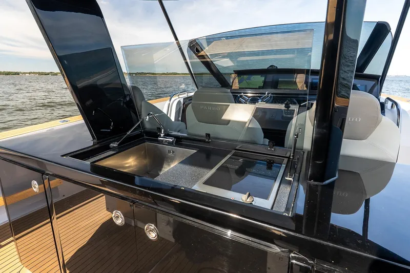  Yacht Photos Pics 2023 Pardo Yachts 43 with sleek outdoor kitchen and luxurious seating on open water.