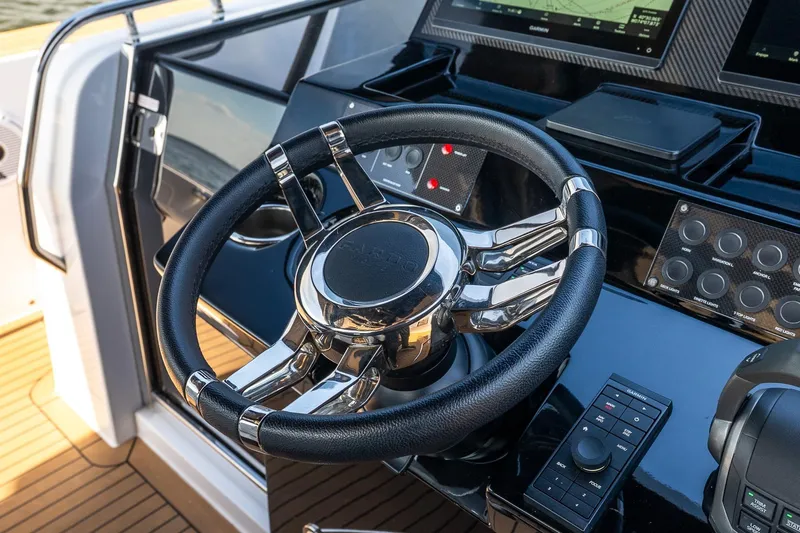  Yacht Photos Pics Steering wheel of 2023 Pardo Yachts 43, featuring modern navigation controls.