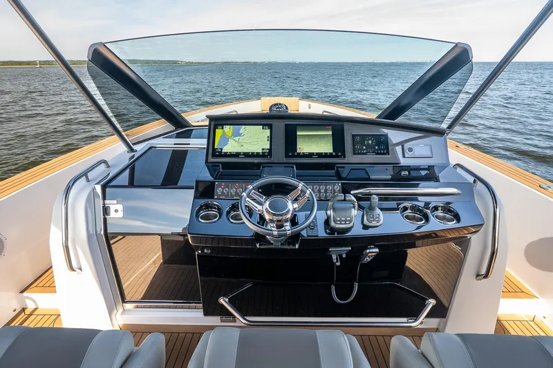  Yacht Photos Pics 2023 Pardo Yachts 43 helm with modern navigation systems and ocean view.