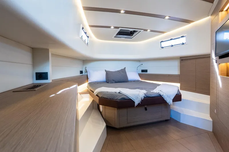  Yacht Photos Pics Luxurious interior of 2023 Pardo Yachts 43, featuring a cozy bed and modern design.