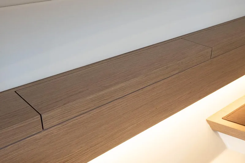  Yacht Photos Pics Interior detail of 2023 Pardo Yachts 43, featuring sleek wooden paneling and modern design.